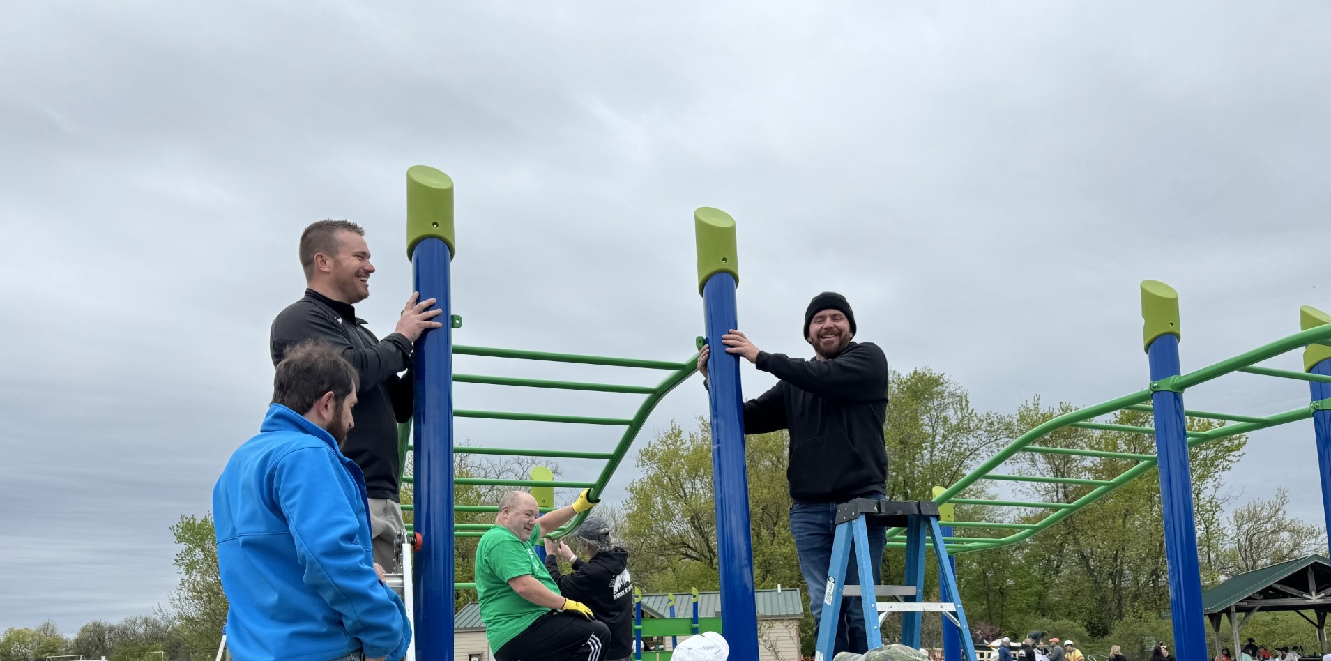 Building Community: Volunteers Come Together for Ninja Warrior Themed Playground Equipment Installation